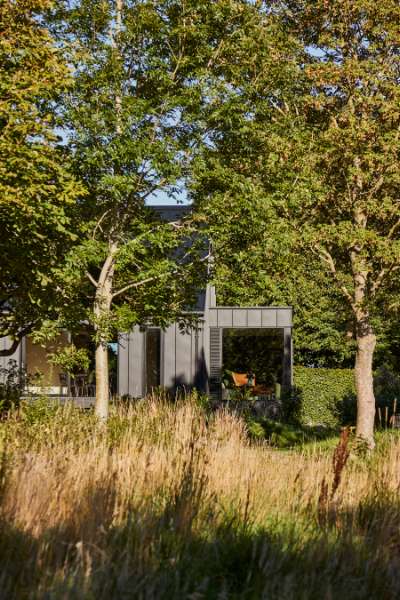 “Royal” door, found in Christiania, now installed in a steel façade, Volstrupvej 63, 9240 Nibe